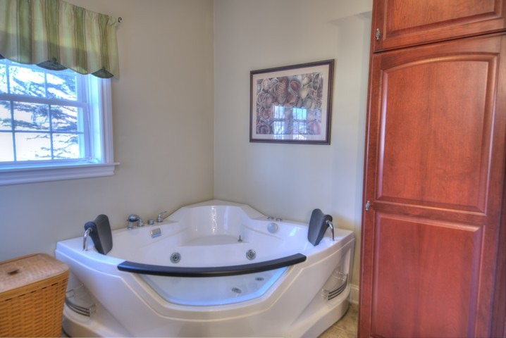53 Old White Bridge Road Waynesboro, VA 22980 - Photo 27 of 49 a bathroom with a tub and sink