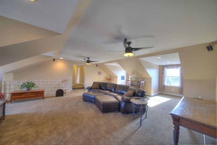 53 Old White Bridge Road Waynesboro, VA 22980 - Photo 31 of 49 a living room with furniture and a chandelier