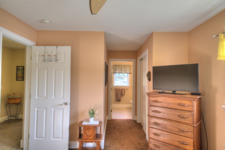 53 Old White Bridge Road Waynesboro, VA 22980 - Photo 38 of 49 a living room with furniture and a flat screen tv
