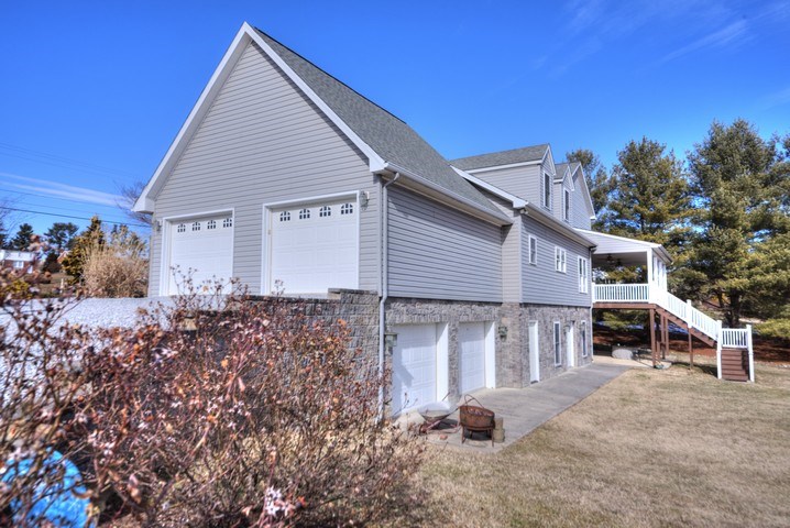 53 Old White Bridge Road Waynesboro, VA 22980 - Photo 48 of 49 a view of a house with backyard and sitting area
