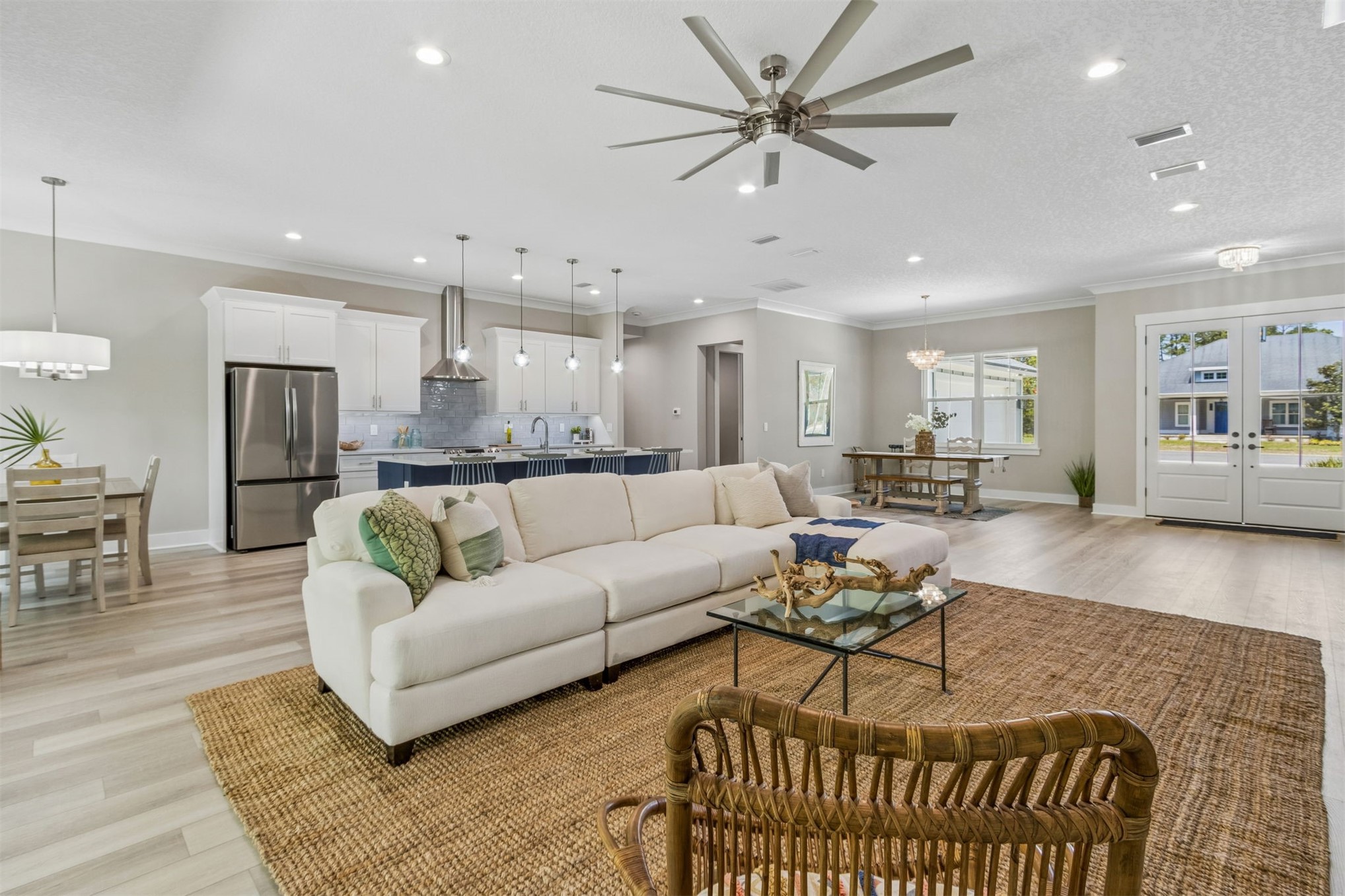 96050 Captains Pointe Road Yulee, FL 32097 - Photo 9 of 36 a living room with furniture and kitchen view