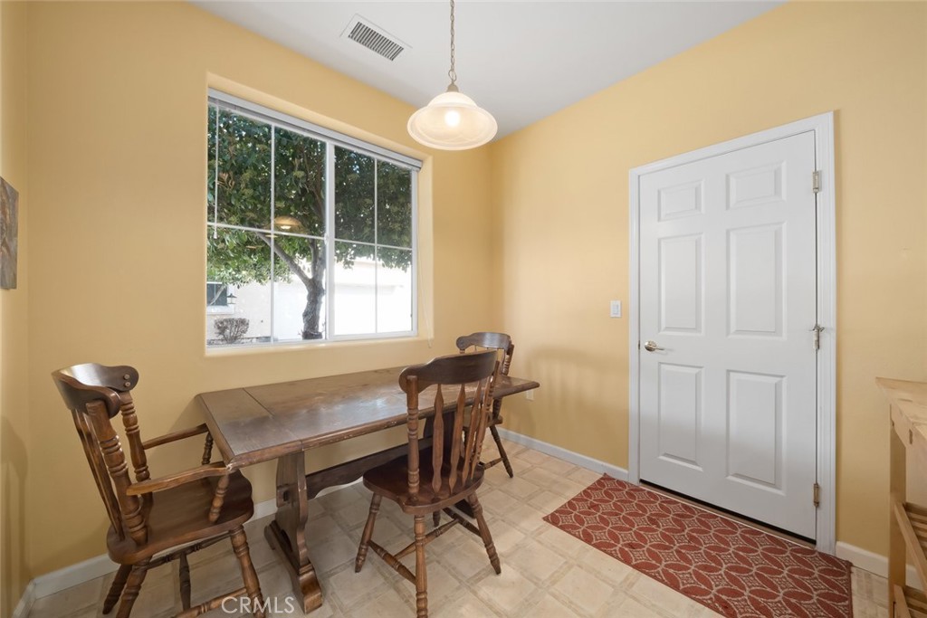 733 Cottage Lane Paso Robles, CA 93446 - Photo 16 of 47 a view of a dining room with furniture and window