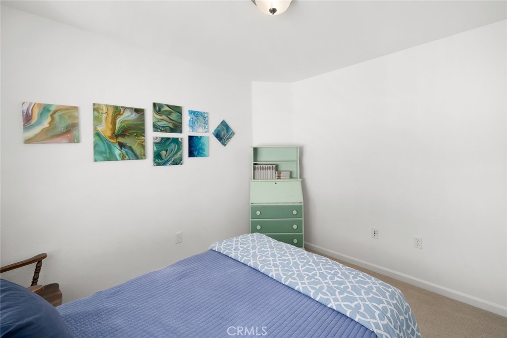 733 Cottage Lane Paso Robles, CA 93446 - Photo 22 of 47 a bedroom with a bed and a window