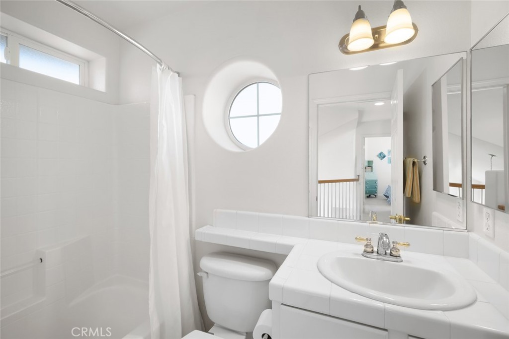 733 Cottage Lane Paso Robles, CA 93446 - Photo 24 of 47 a bathroom with a sink and a mirror