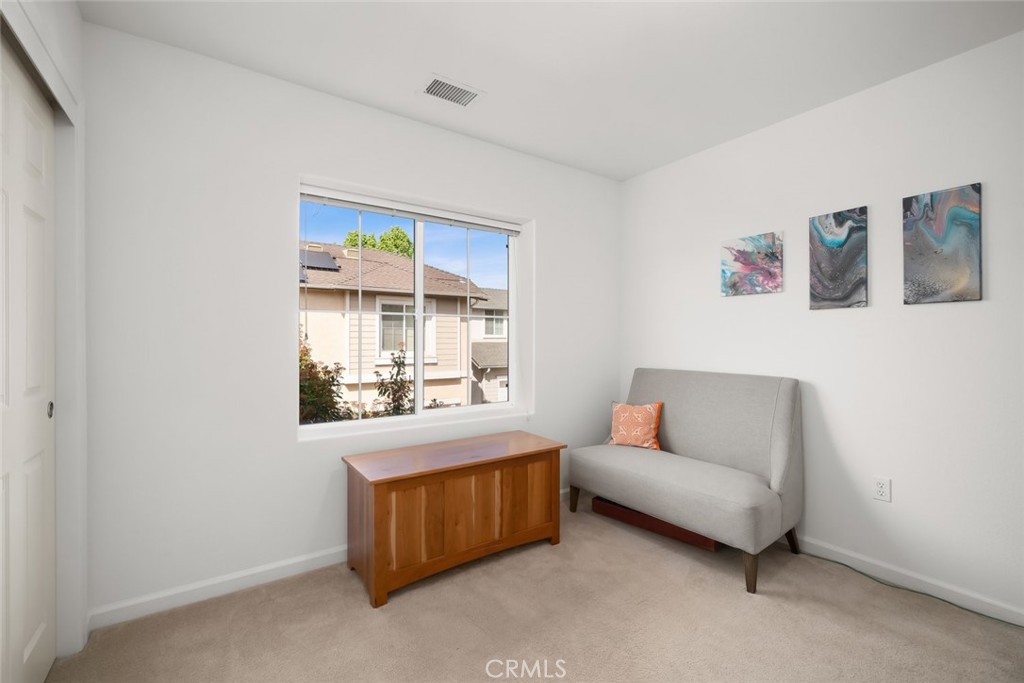 733 Cottage Lane Paso Robles, CA 93446 - Photo 25 of 47 a living room with a couch and a window