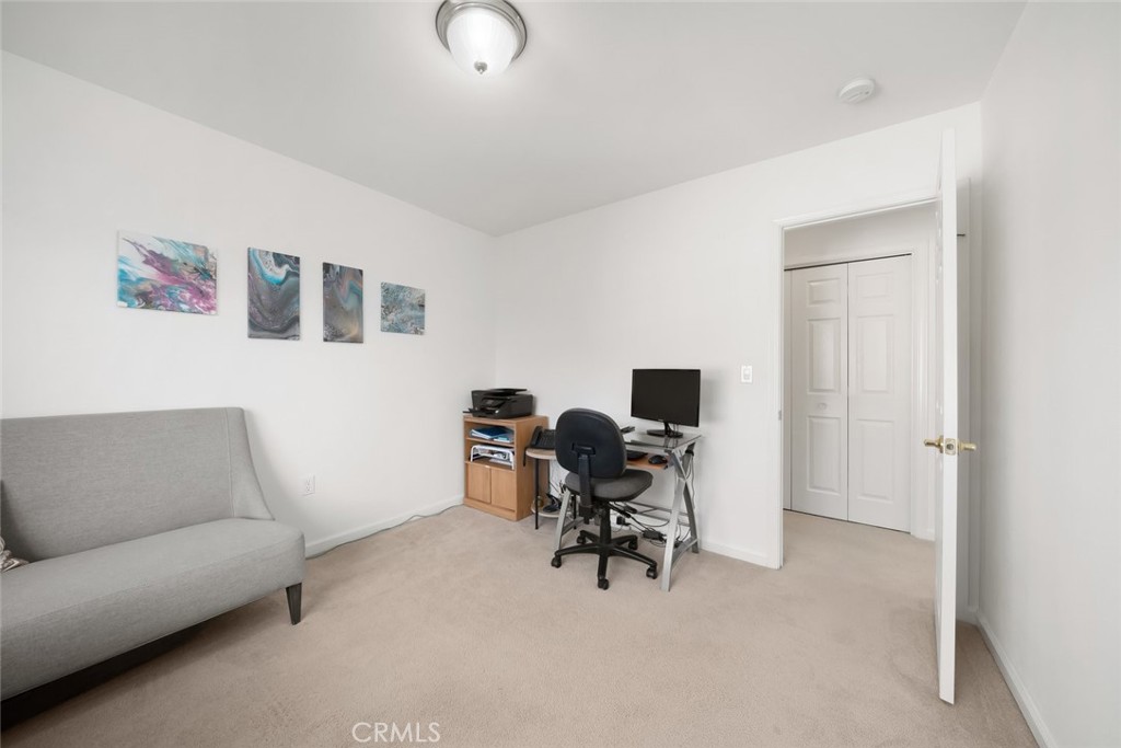 733 Cottage Lane Paso Robles, CA 93446 - Photo 27 of 47 a living room with furniture and a flat screen tv