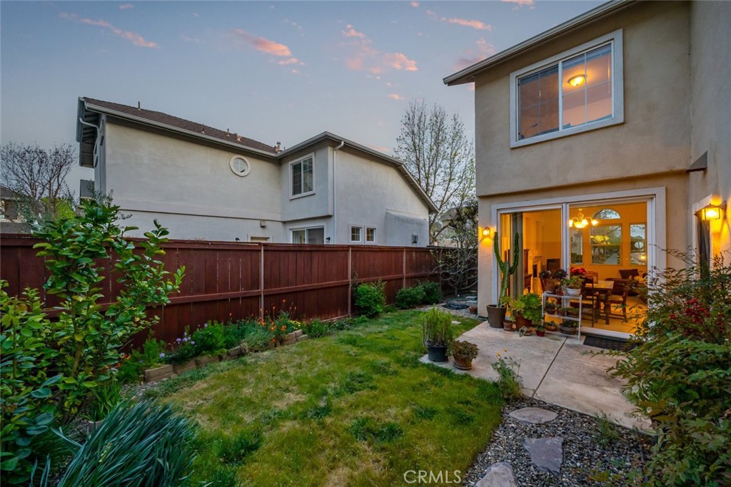 733 Cottage Lane Paso Robles, CA 93446 - Photo 37 of 47 a view of a chair and table in backyard of the house