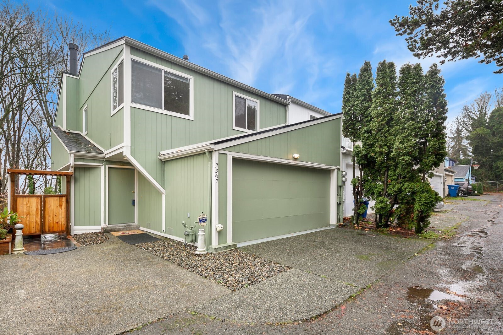 2367 South Forest Street Seattle, WA 98144 - Photo 1 of 33 a view of a house with a yard and garage