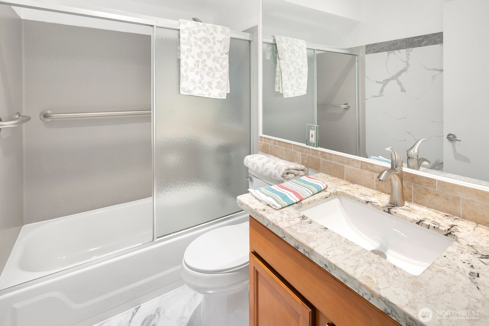 2367 South Forest Street Seattle, WA 98144 - Photo 12 of 33 a bathroom with a granite countertop sink toilet and shower