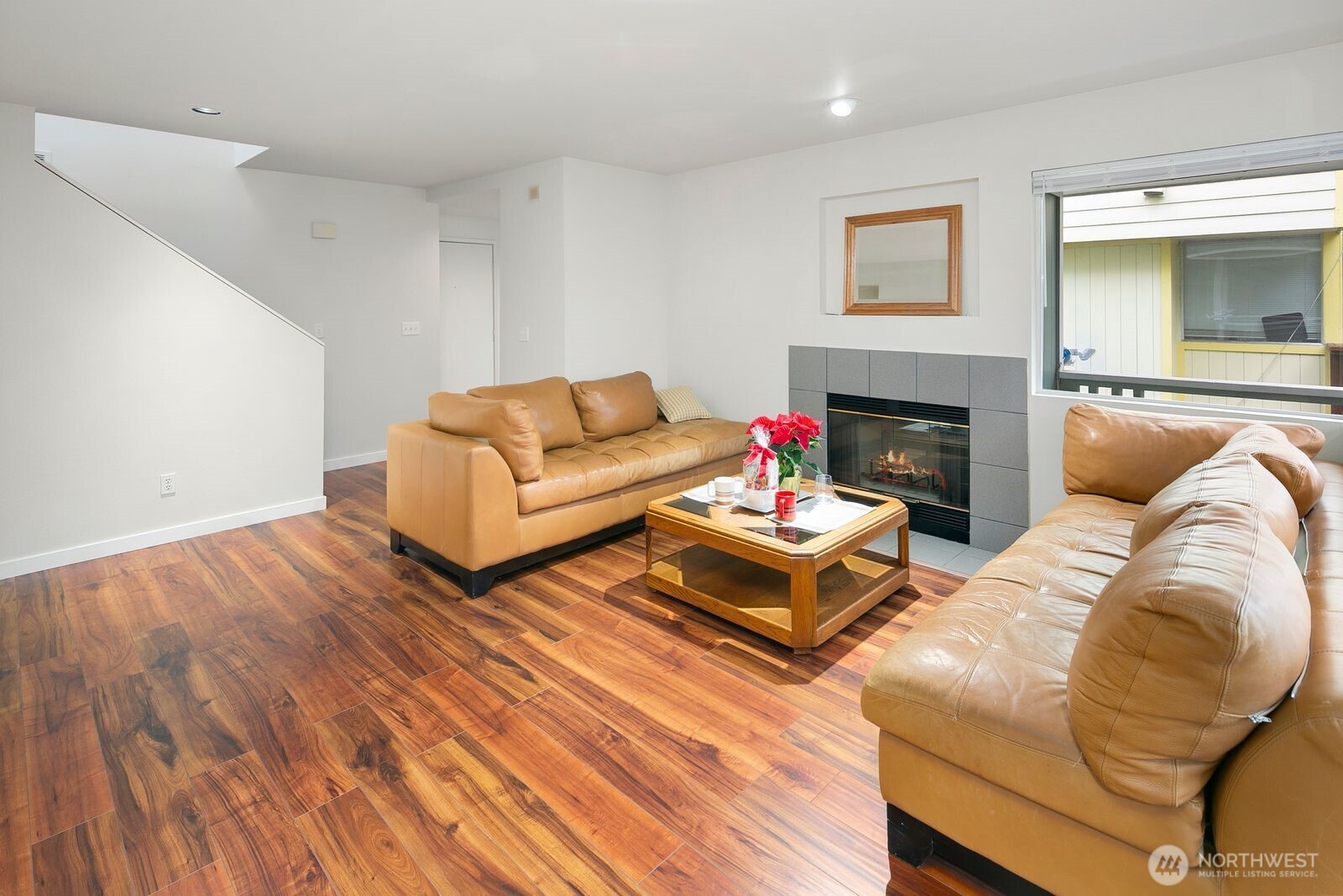 2367 South Forest Street Seattle, WA 98144 - Photo 3 of 33 a living room with furniture and a fireplace