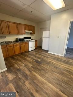 21614 Great Mills Road, Unit 104 Lexington Park, MD 20653 - Photo 15 of 17 a kitchen with stainless steel appliances granite countertop a stove a sink and a refrigerator