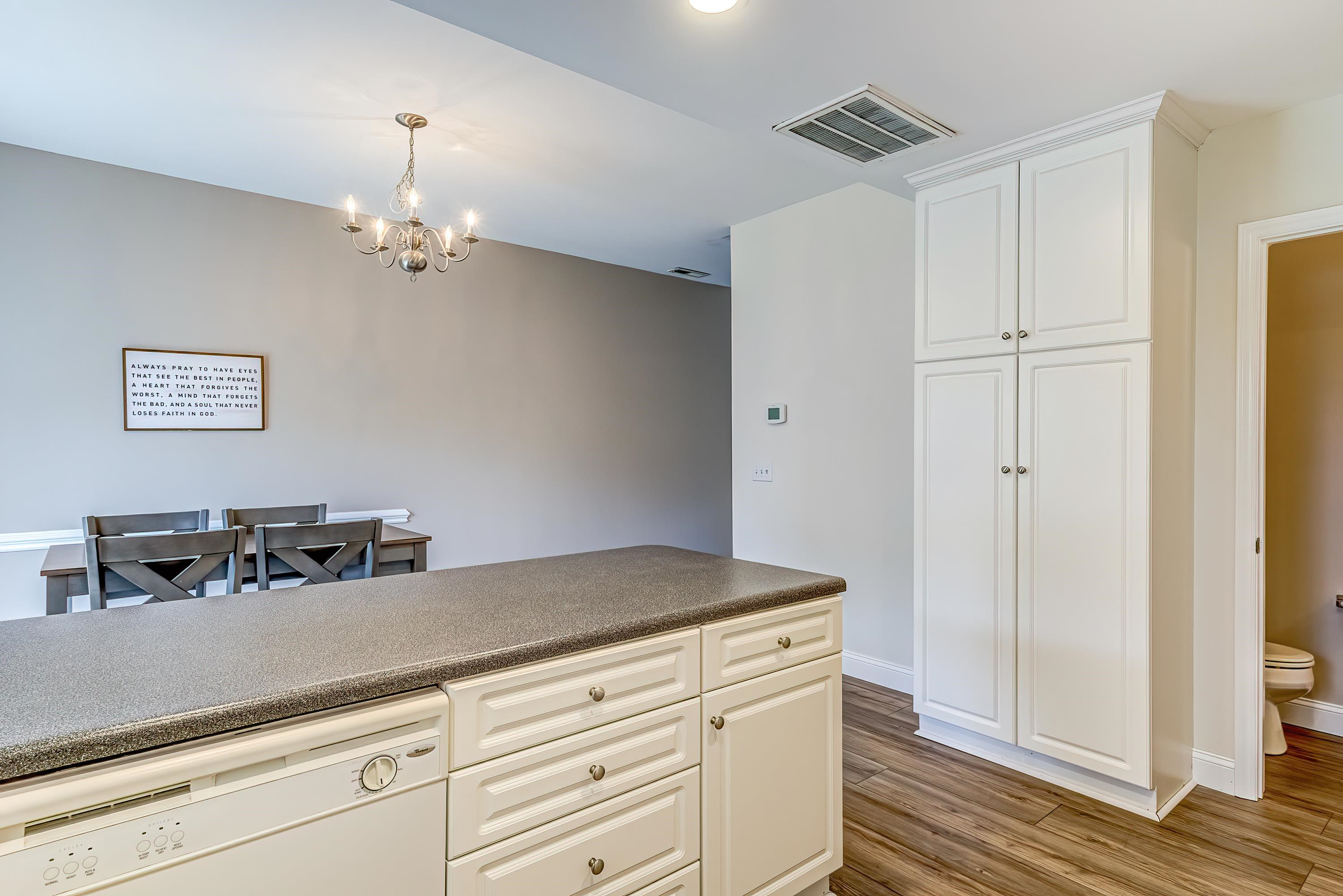 2131 Piney Brook Road, Unit 104 Raleigh, NC 27614 - Photo 18 of 37 a bathroom with a sink and a mirror