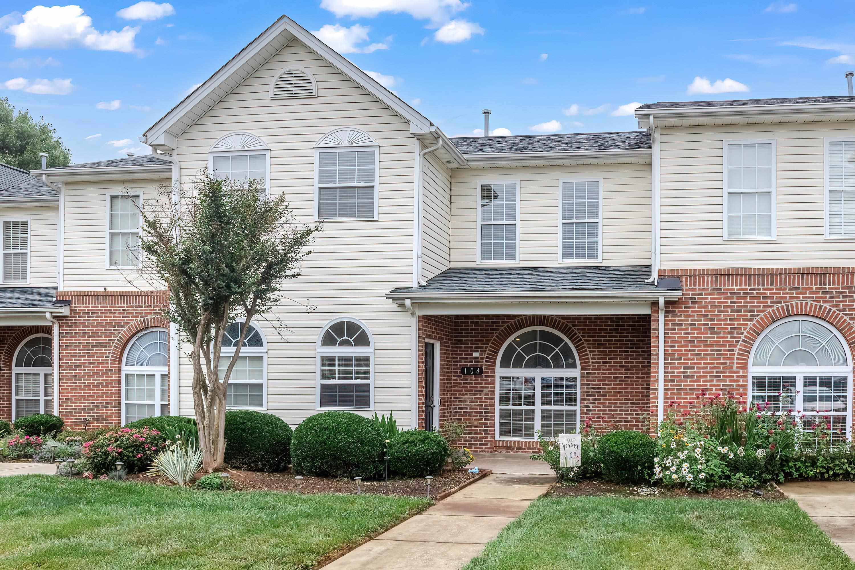 2131 Piney Brook Road, Unit 104 Raleigh, NC 27614 - Photo 2 of 37 a front view of a house with garden