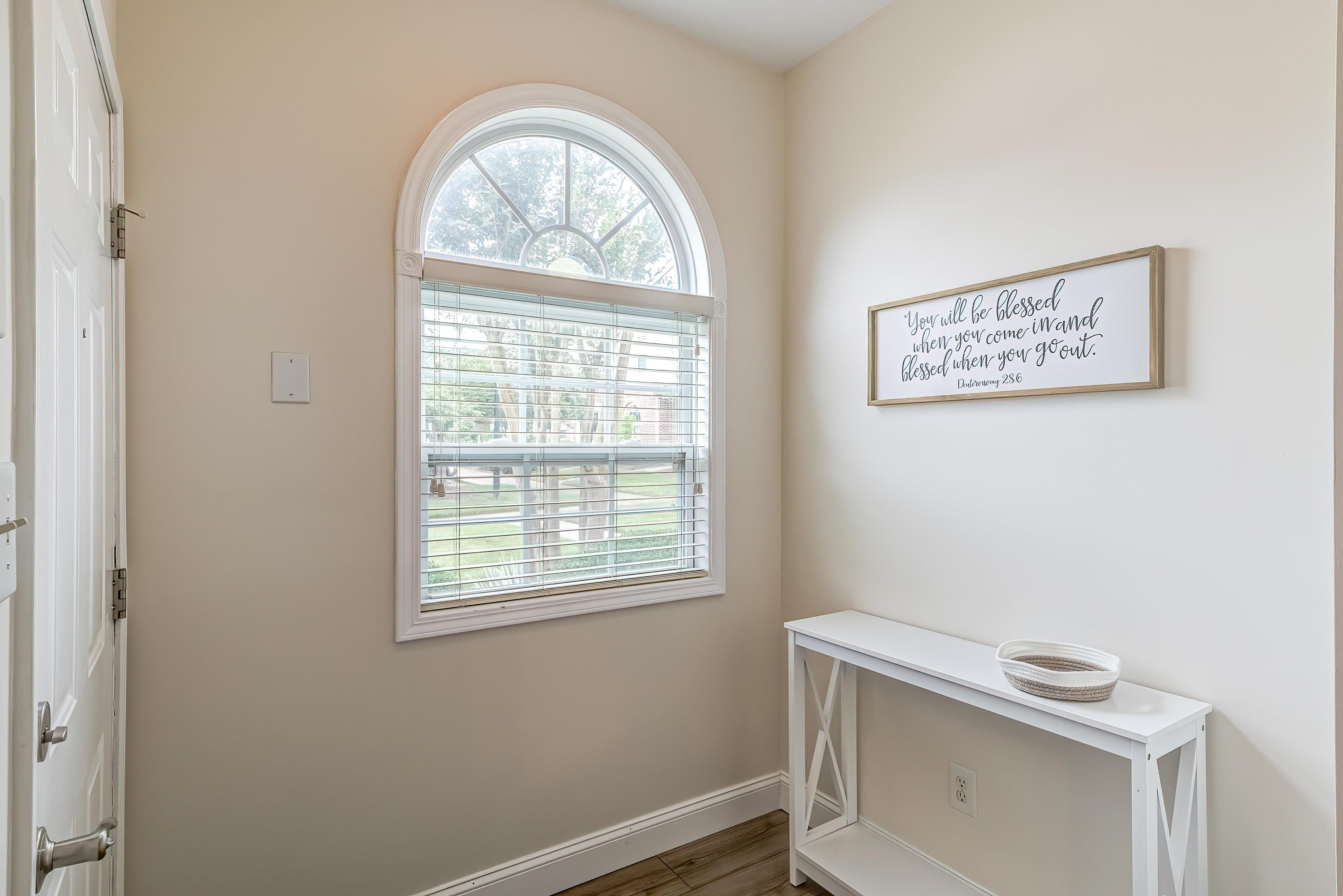 2131 Piney Brook Road, Unit 104 Raleigh, NC 27614 - Photo 5 of 37 a view of a room that has a window in it