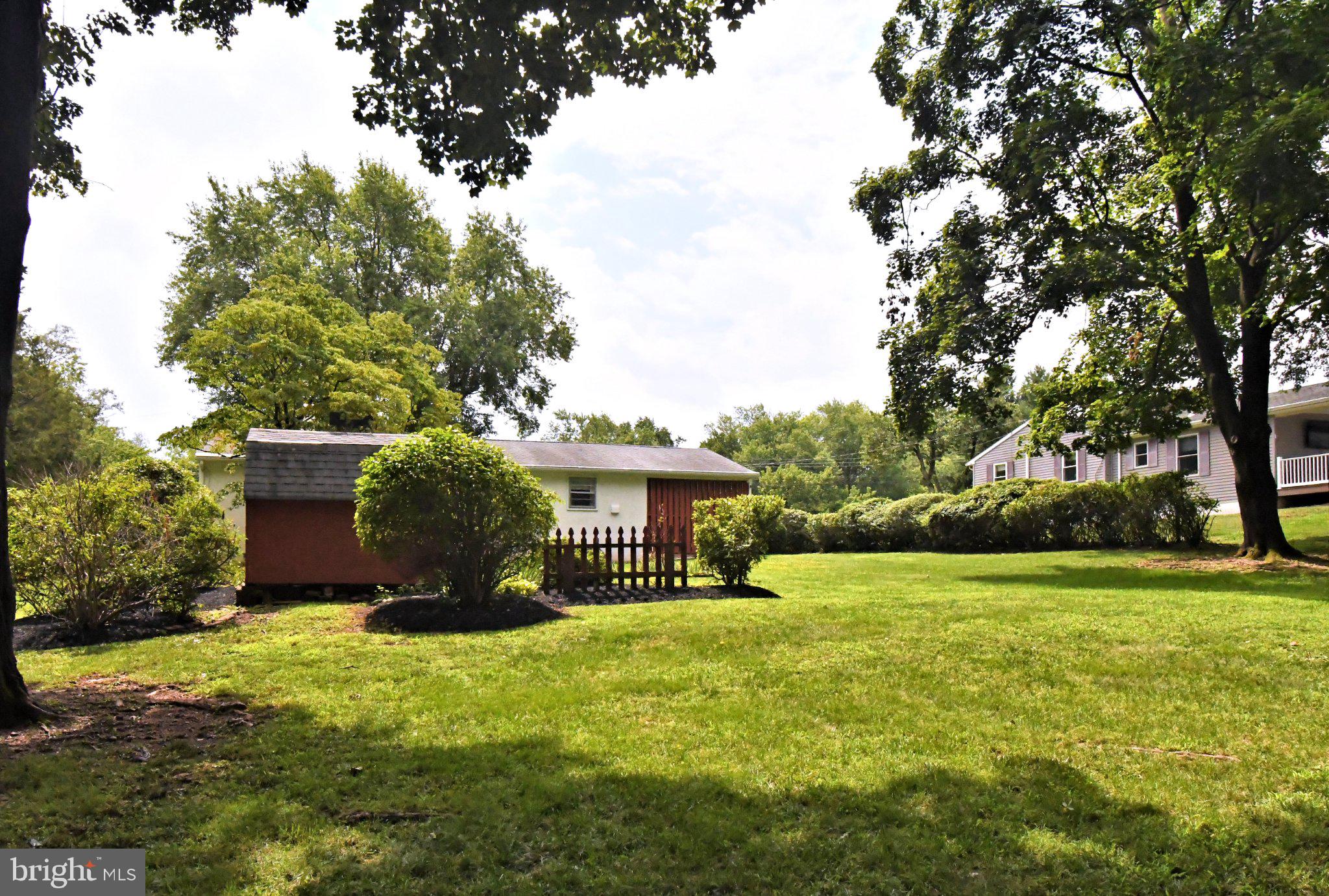 112 Pennapacker Road Collegeville, PA 19426 - Photo 39 of 43 Charming yard with lush greenery.