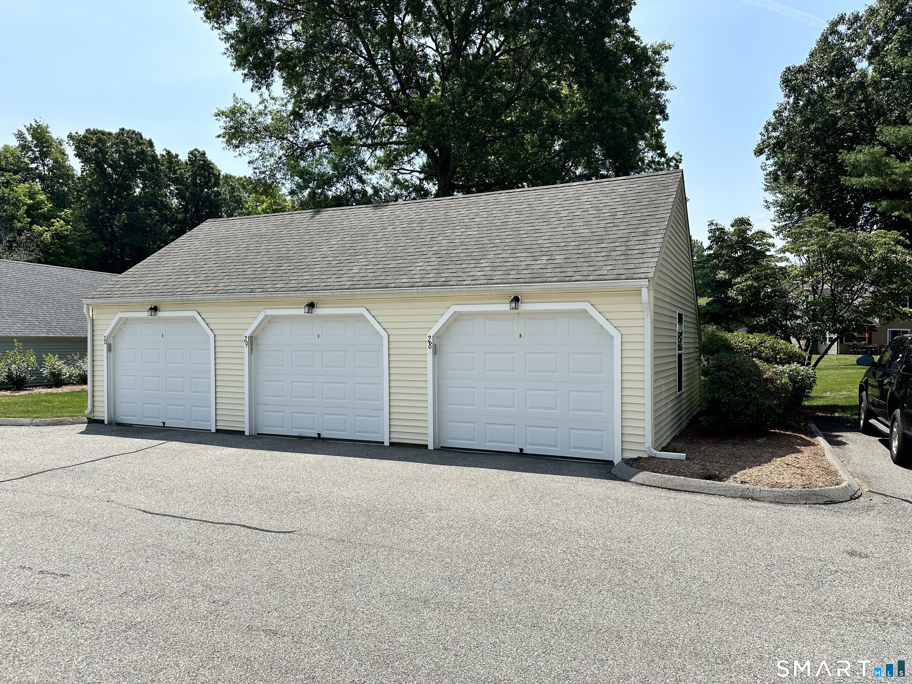 29 Wilshire Road, Unit 29 Madison, CT 06443 - Photo 6 of 6 Detached garage with room for storage too!