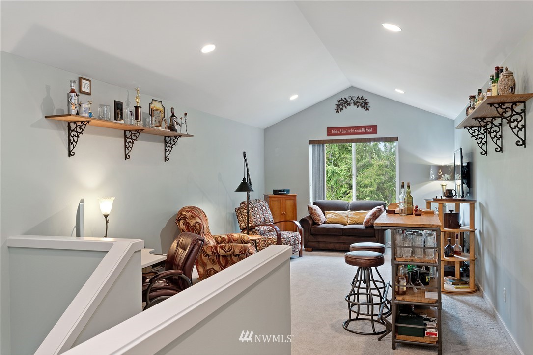 320 Blue Glacier Loop Sequim, WA 98382 - Photo 26 of 38 a living room with furniture and a window