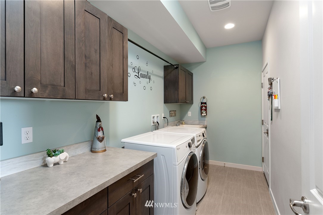 320 Blue Glacier Loop Sequim, WA 98382 - Photo 29 of 38 a utility room with dryer and washer