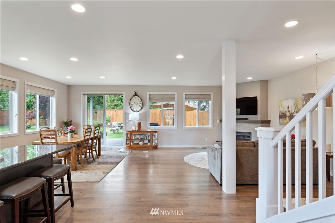 320 Blue Glacier Loop Sequim, WA 98382 - Photo 6 of 38 a living room with furniture wooden floor and a large window