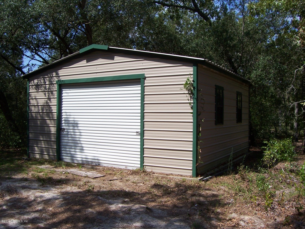 5671 Chugah Street Keystone Heights, FL 32656 - Photo 6 of 21 a view of a house with a yard