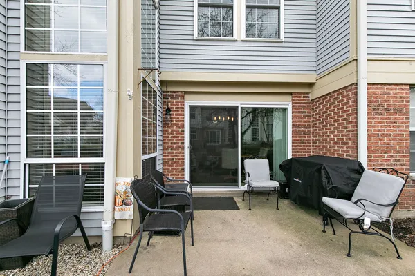 a view of a house with a lounge chair