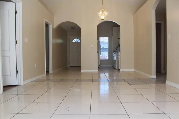a view of livingroom with hallway and bathroom