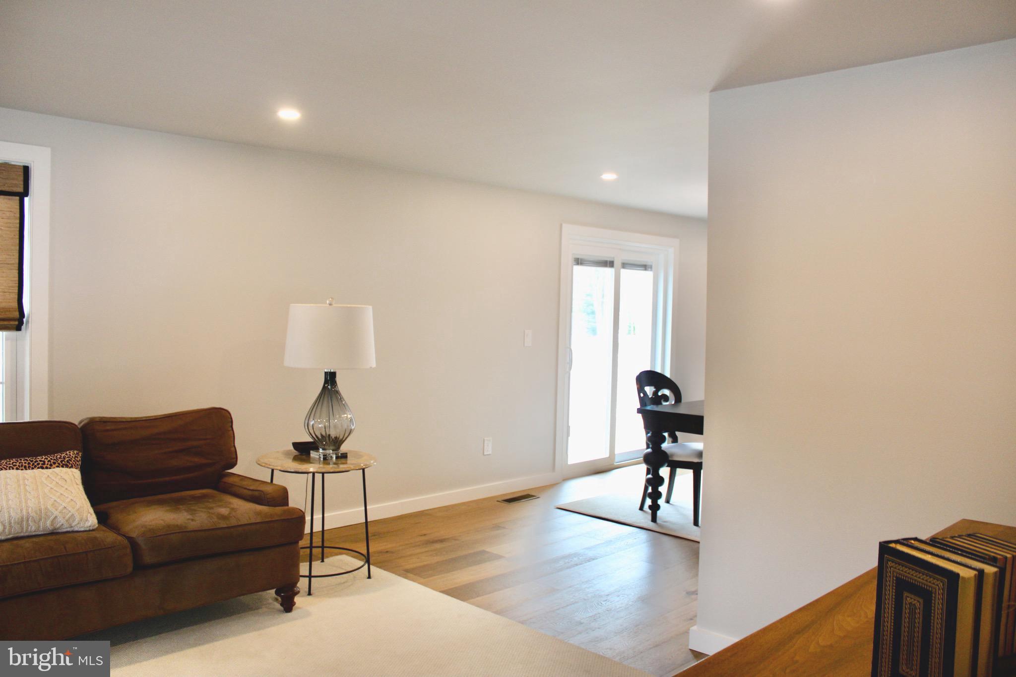 37 Cherry Lane Doylestown, PA 18901 - Photo 19 of 75 a living room with furniture and a wooden floor