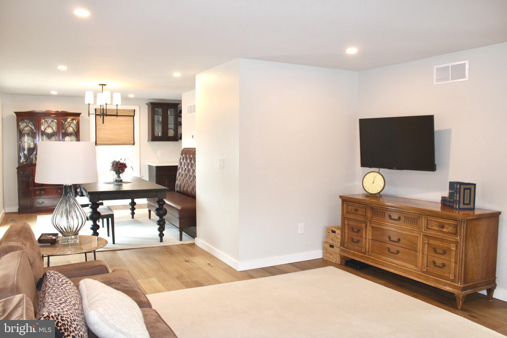 37 Cherry Lane Doylestown, PA 18901 - Photo 20 of 75 a living room with furniture and a flat screen tv