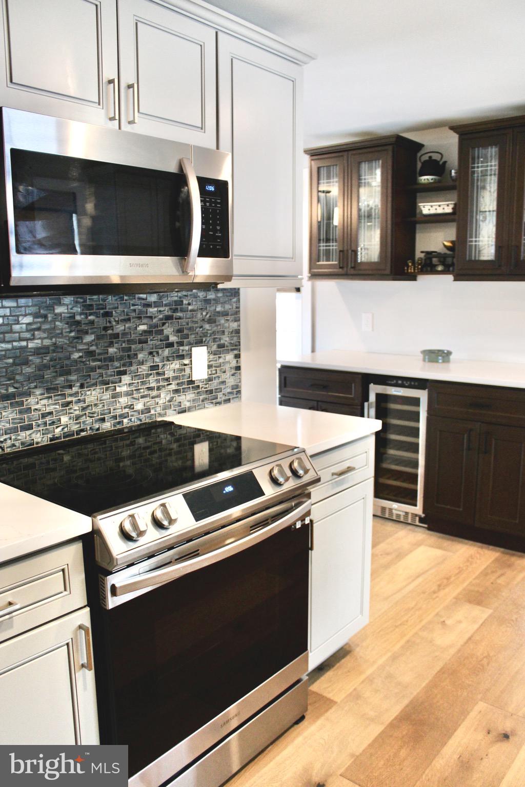 37 Cherry Lane Doylestown, PA 18901 - Photo 28 of 75 a kitchen with stainless steel appliances granite countertop a stove and a sink