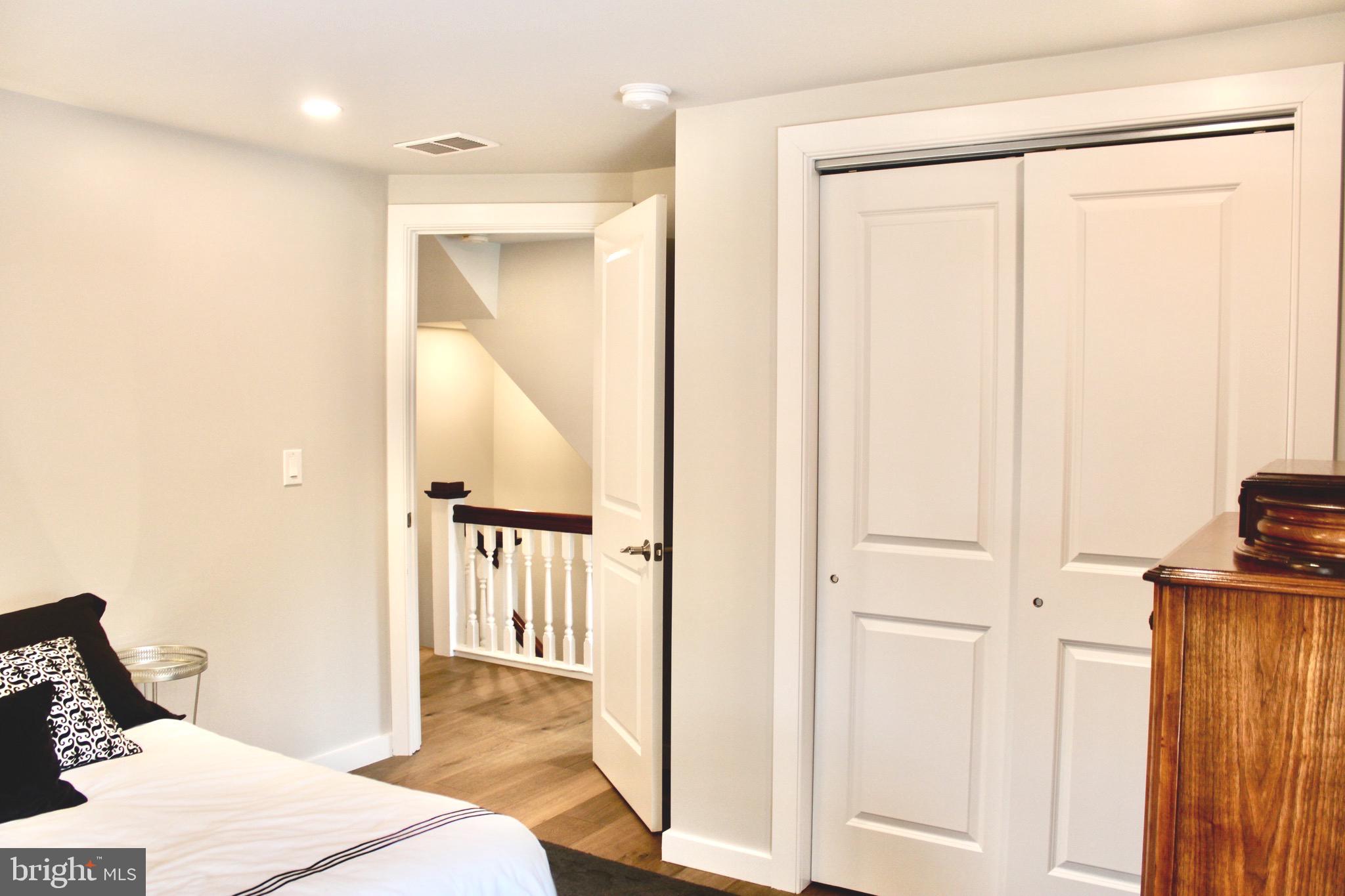 37 Cherry Lane Doylestown, PA 18901 - Photo 40 of 75 a bedroom with a bed and a wooden floor