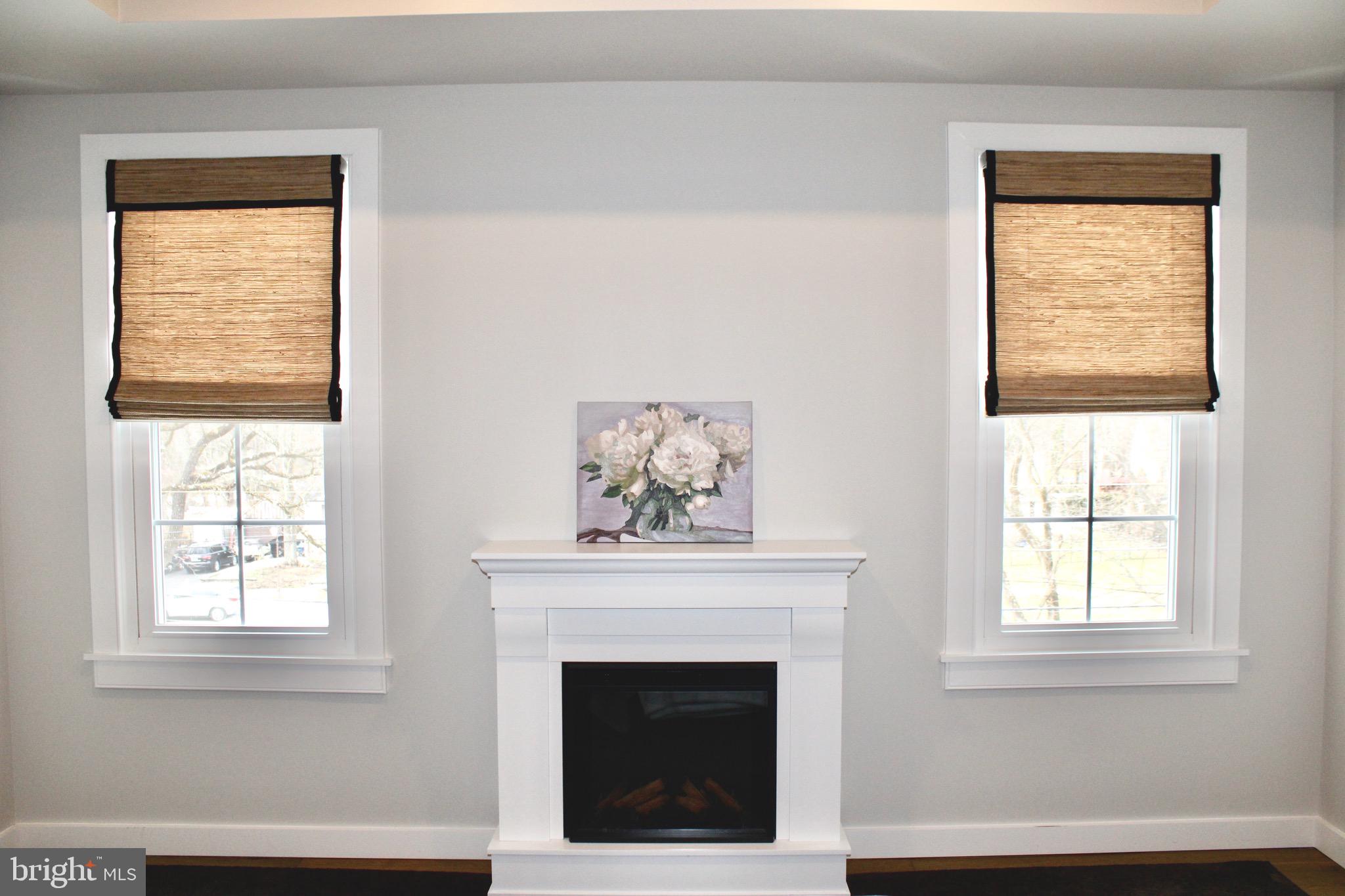 37 Cherry Lane Doylestown, PA 18901 - Photo 51 of 75 an empty room with windows and fireplace