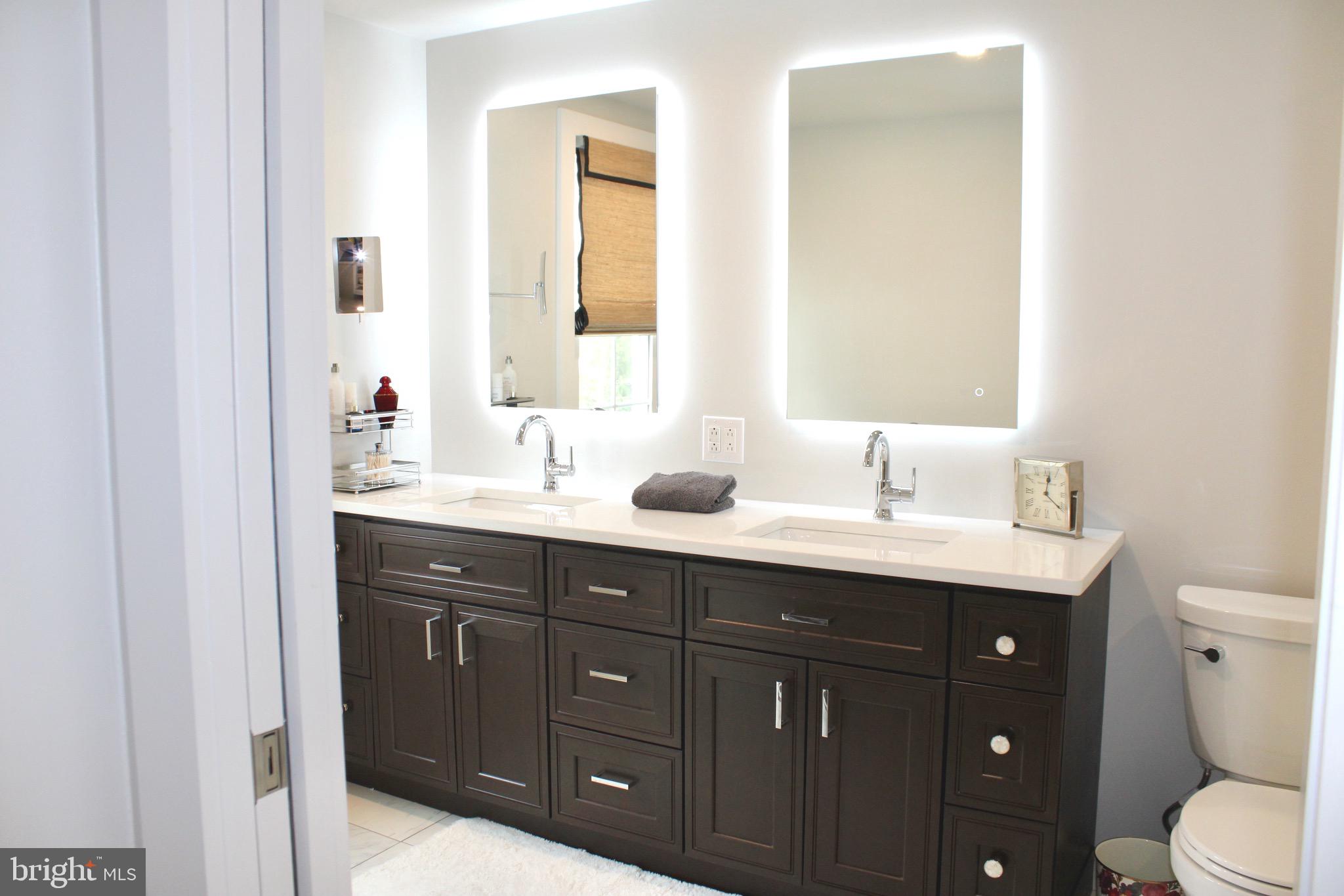 37 Cherry Lane Doylestown, PA 18901 - Photo 54 of 75 a bathroom with a sink vanity and a toilet