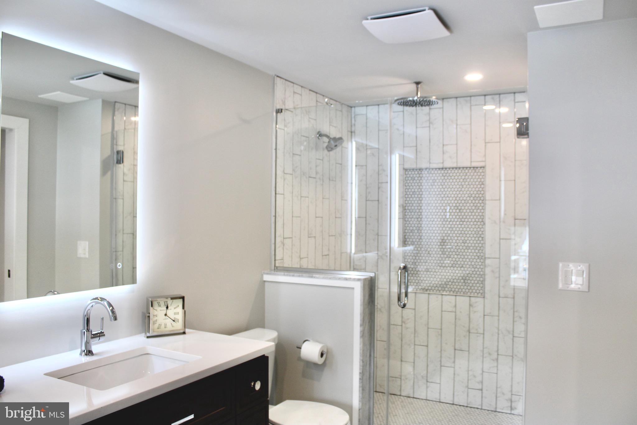 37 Cherry Lane Doylestown, PA 18901 - Photo 55 of 75 a bathroom with a sink toilet and shower