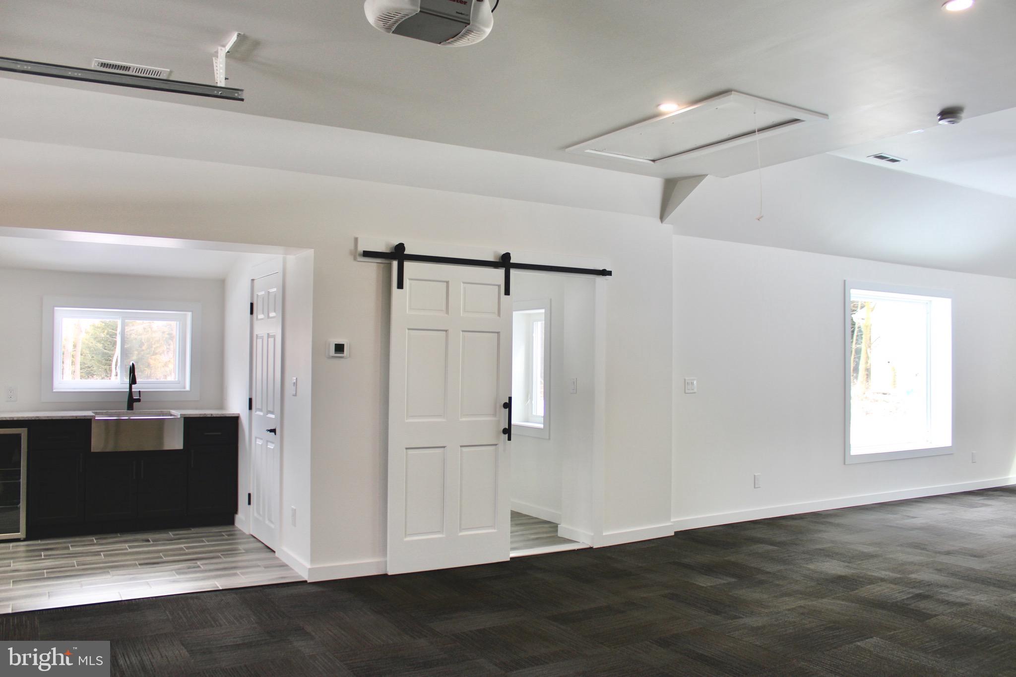 37 Cherry Lane Doylestown, PA 18901 - Photo 62 of 75 a view of empty room with wooden floor and window