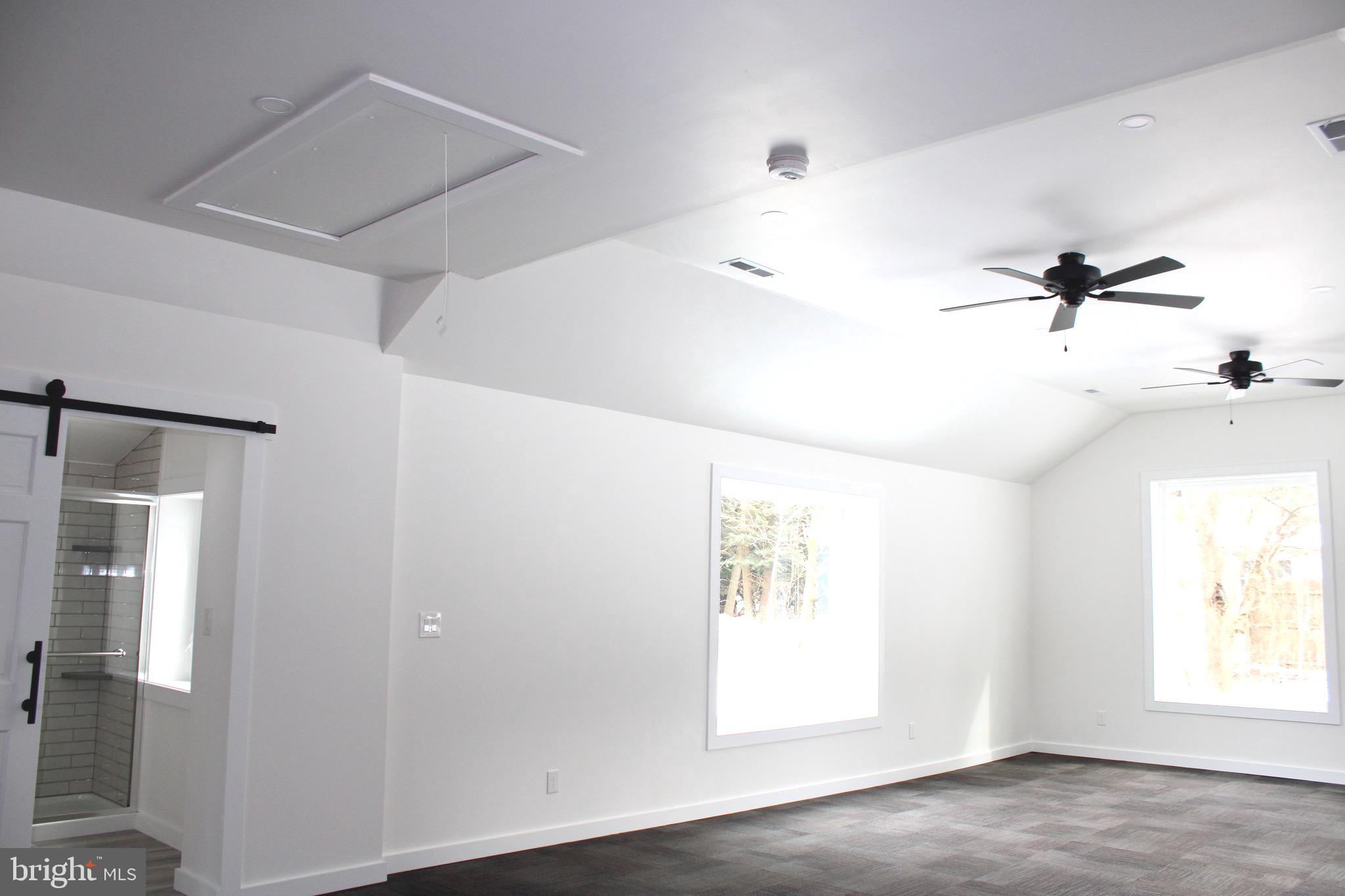 37 Cherry Lane Doylestown, PA 18901 - Photo 65 of 75 a view of empty room with window and ceiling fan