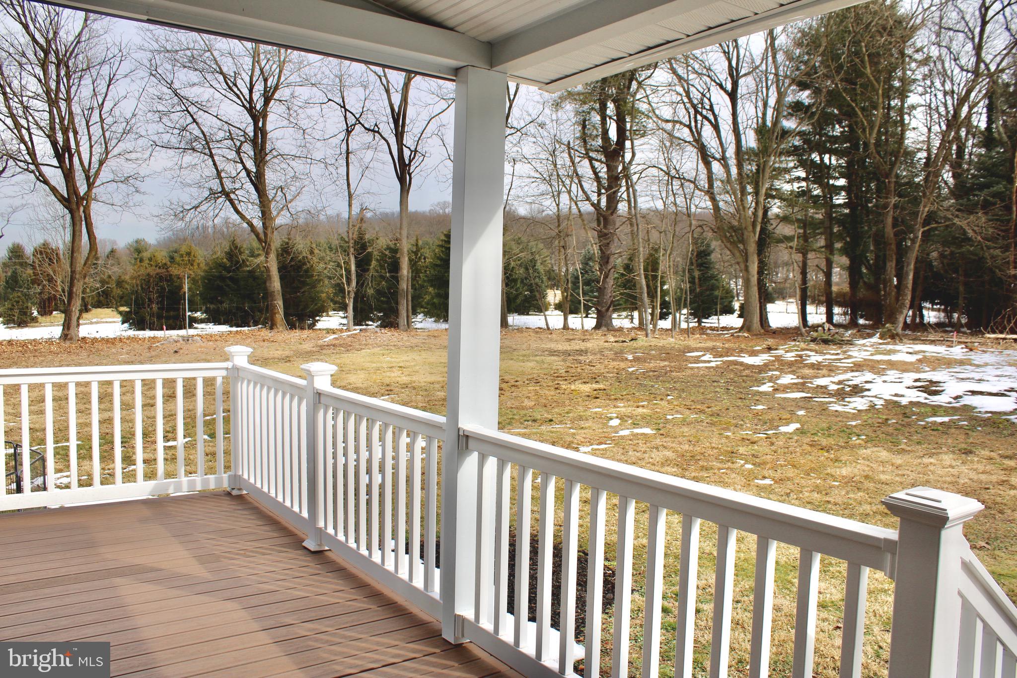 37 Cherry Lane Doylestown, PA 18901 - Photo 10 of 75 a view of a yard with trees from a chairs