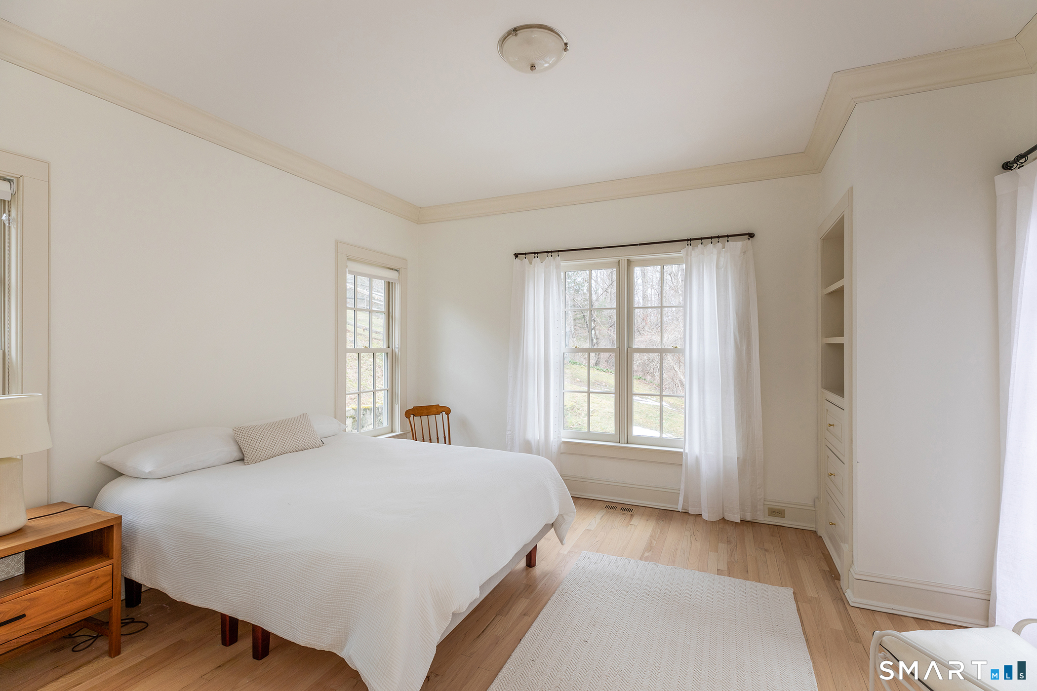 47 Squire Road Roxbury, CT 06783 - Photo 20 of 27 a bedroom with a bed and a window