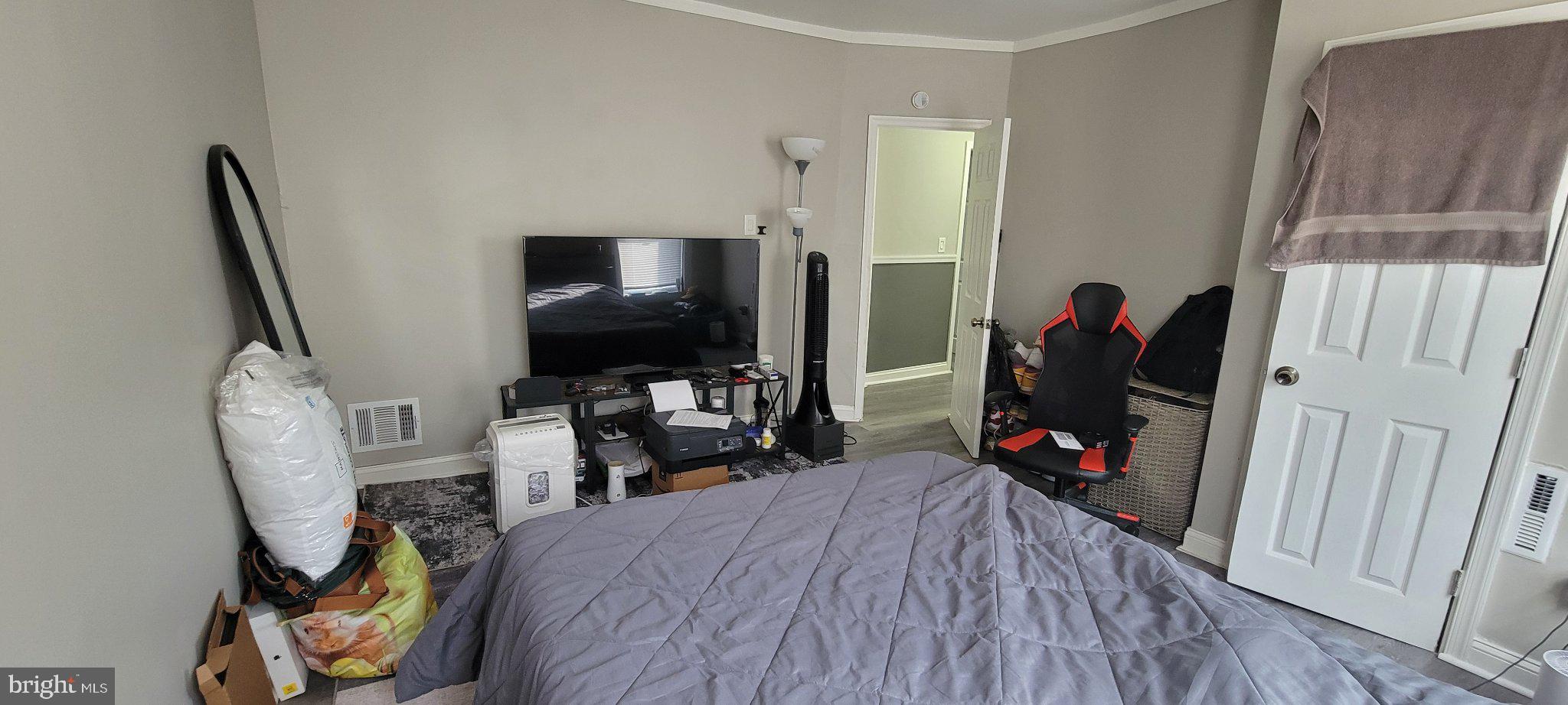 209 North 10th Street Darby, PA 19023 - Photo 24 of 26 Cozy bedroom with modern amenities.