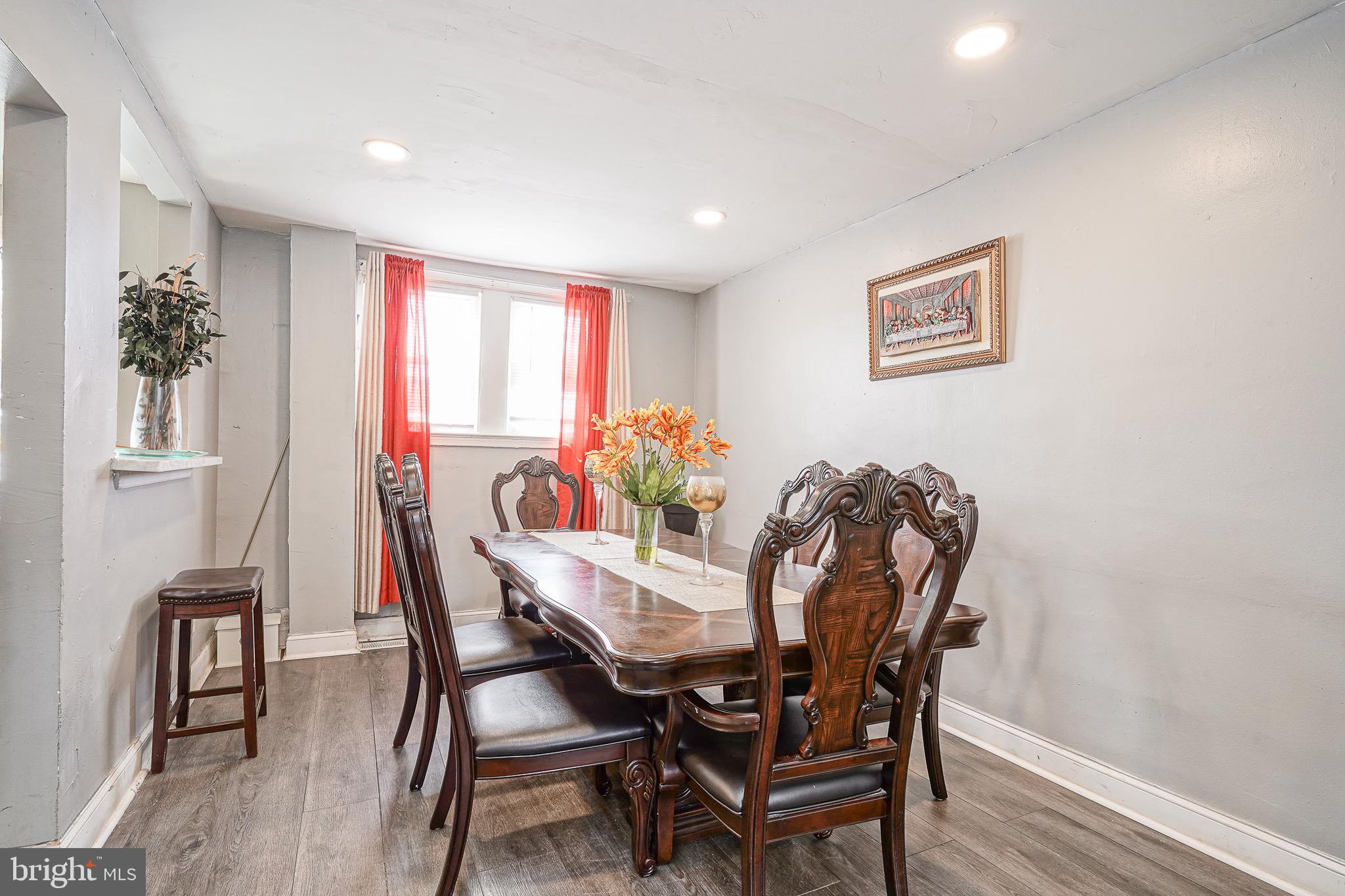 541 Randolph Street Camden, NJ 08105 - Photo 7 of 22 a view of a dining room with furniture and wooden floor