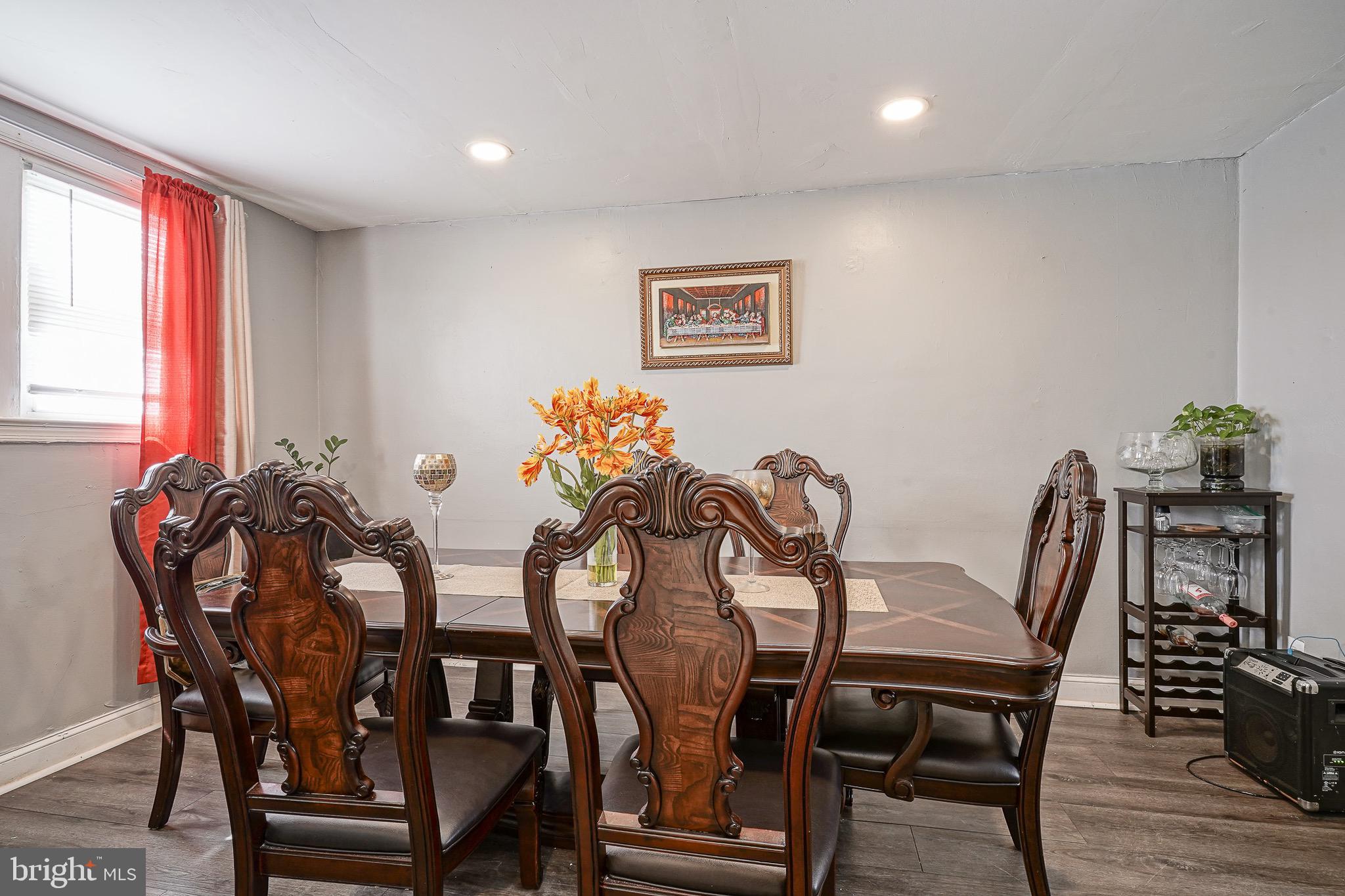 541 Randolph Street Camden, NJ 08105 - Photo 8 of 22 a view of a dining room with furniture and wooden floor