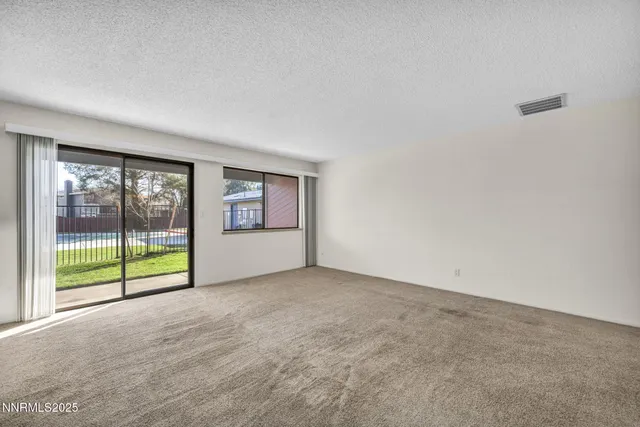 a bathroom with a sink and a large mirror