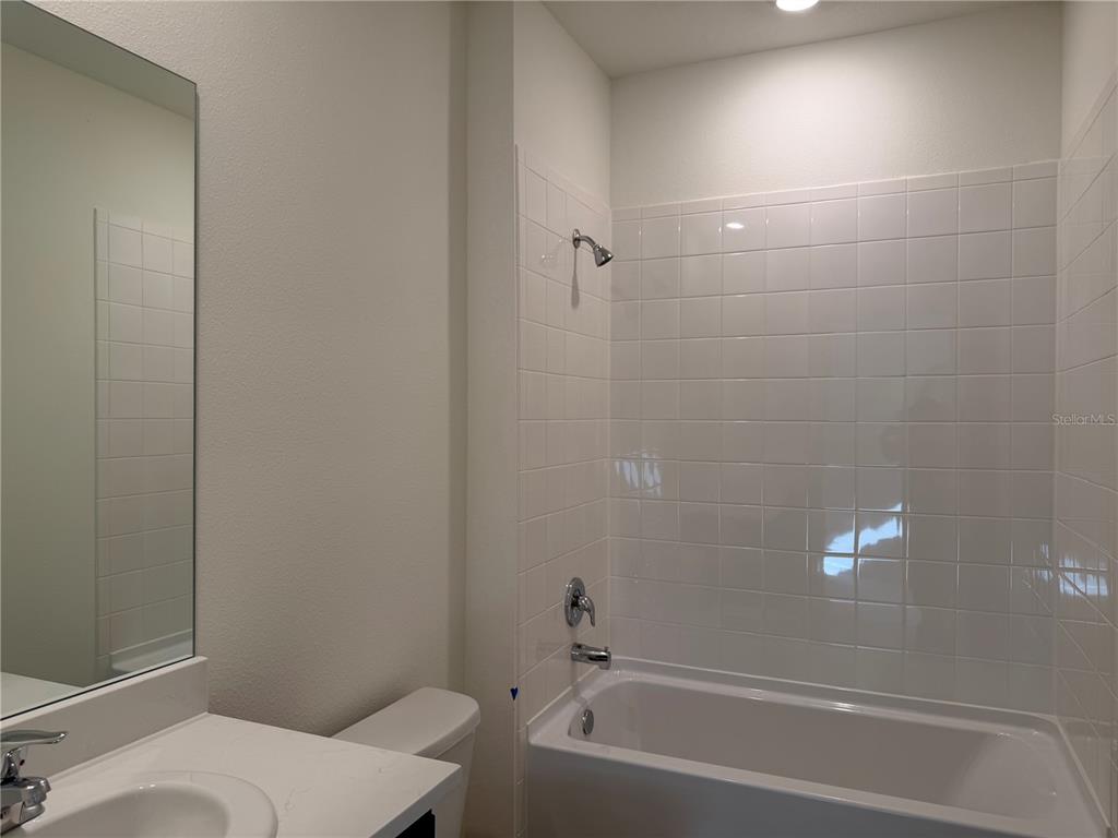 5326 Southwest 52nd Avenue Gainesville, FL 32608 - Photo 7 of 10 a bathroom with a sink and bathtub