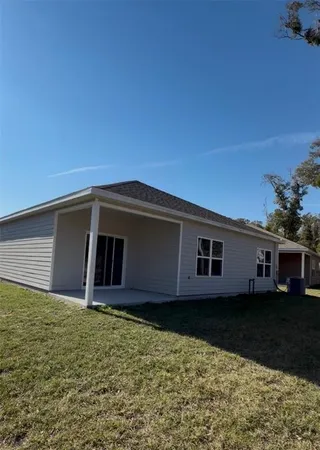 a house with wooden fence