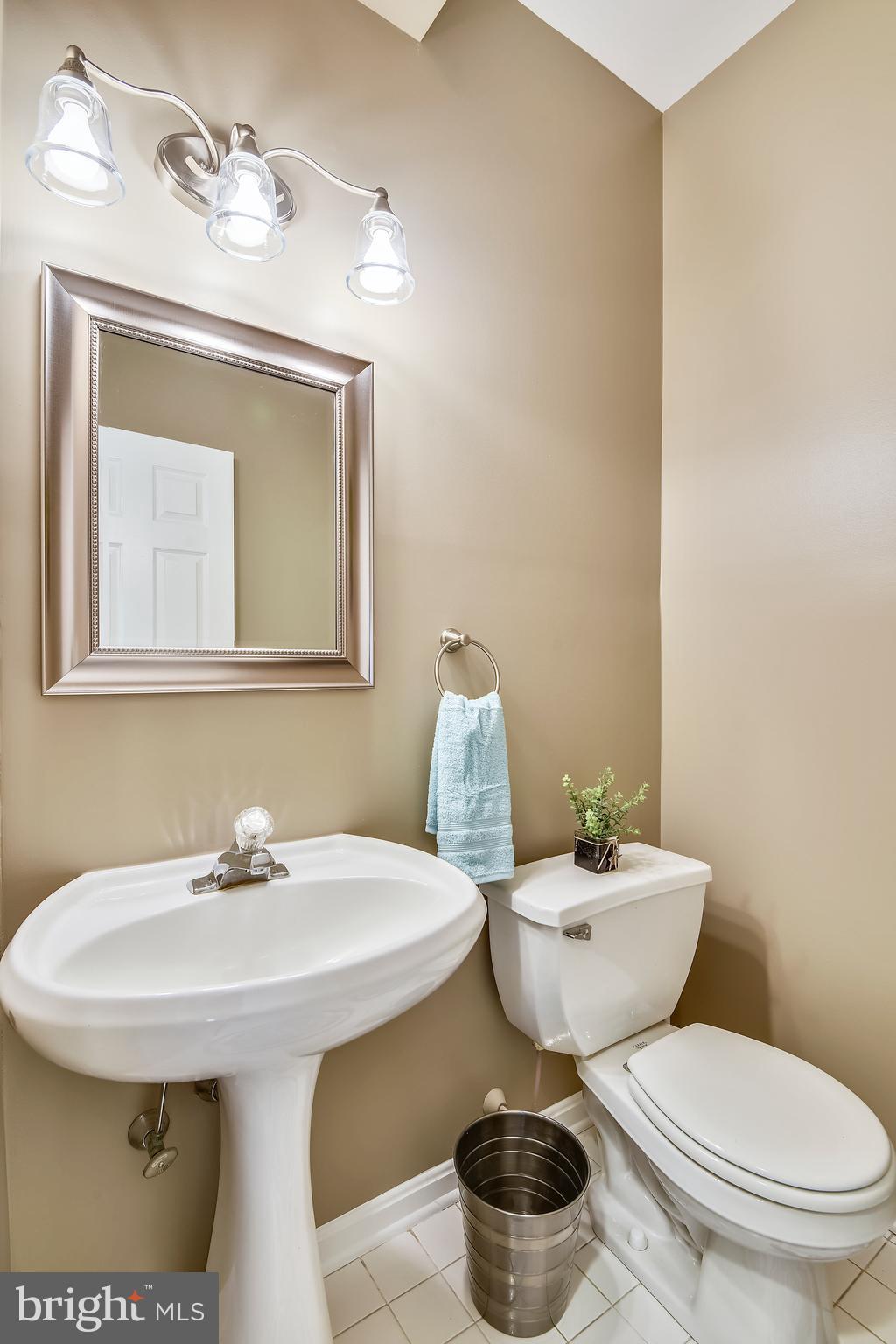 3946 Cove Road Edgewater, MD 21037 - Photo 27 of 52 POWDER ROOM ON MAIN LEVEL