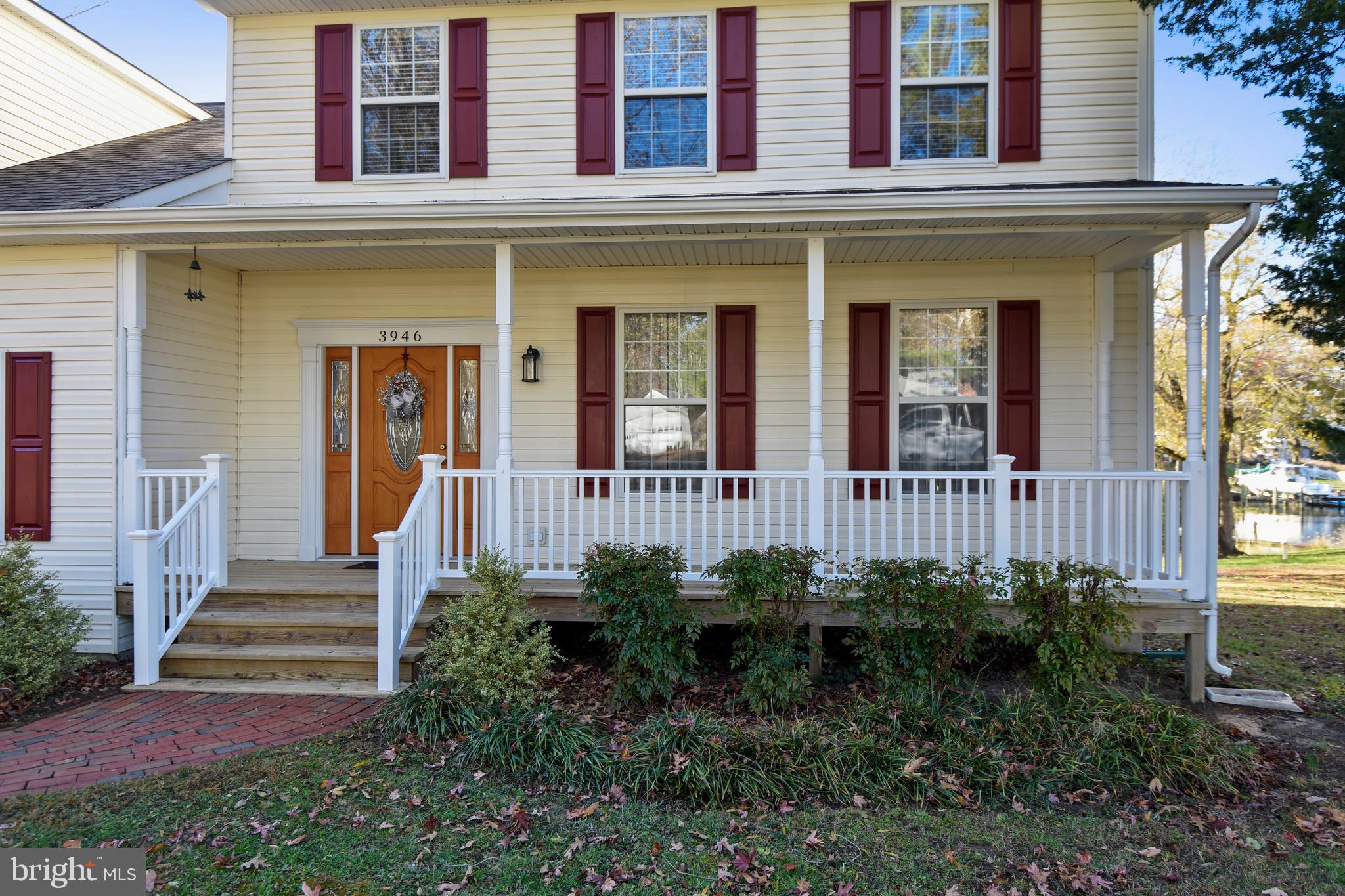 3946 Cove Road Edgewater, MD 21037 - Photo 6 of 52 FRONT PORCH WITH NEW VINYL HANDRAIL