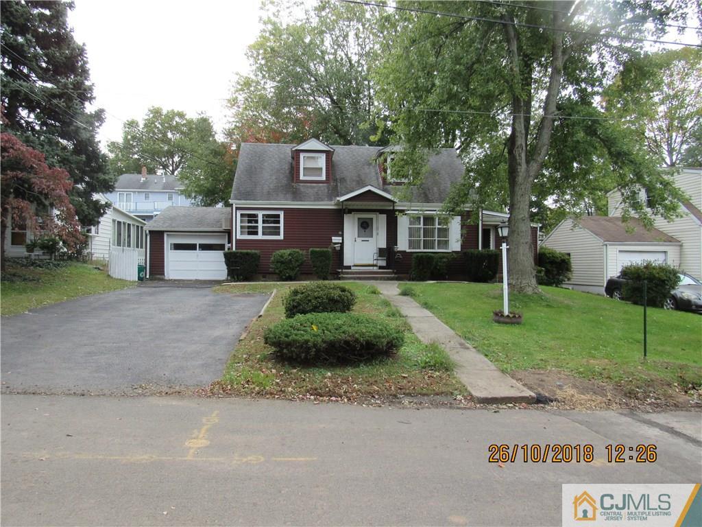 21 Halstead Road New Brunswick, NJ 08901 - Photo 1 of 22 front view of a house with a yard