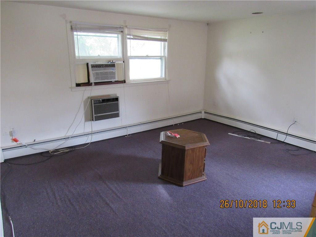 21 Halstead Road New Brunswick, NJ 08901 - Photo 13 of 22 an empty room with windows