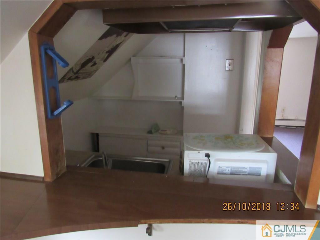 21 Halstead Road New Brunswick, NJ 08901 - Photo 14 of 22 a view of walk in closet