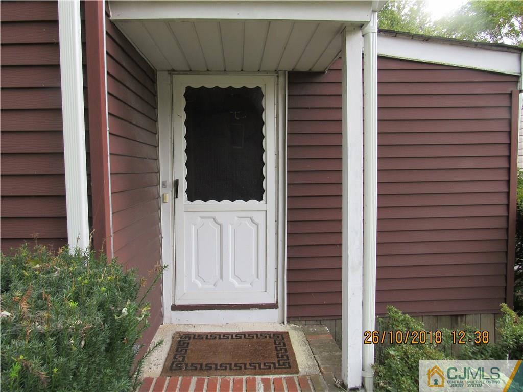 21 Halstead Road New Brunswick, NJ 08901 - Photo 19 of 22 a view of a door of the house and wooden wall