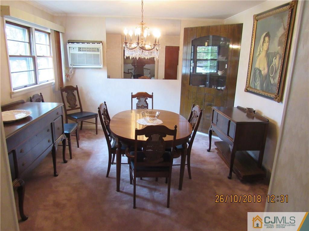 21 Halstead Road New Brunswick, NJ 08901 - Photo 4 of 22 a view of a dining room with furniture and window